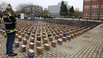 MADRID, SPAIN - DECEMBER 12: Police officers show the cocaine seized in an operation against drug trafficking during an appearance at the Canillas Police Complex on December 12, 2023, in Madrid, Spain. A total of 11 tons of cocaine were seized in two parallel operations carried out in Vigo, where 7.5 tons were intercepted hidden among frozen tuna loins, and in Valencia, where 3.4 tons were found in a double bottom of containers. During the operation, 20 people belonging to criminal organizations of Balkan origin dedicated to drug trafficking were arrested. The volume of the substance seized makes it one of the most important operations in recent years in Spain. (Photo By Marta Fernandez Jara/Europa Press via Getty Images)