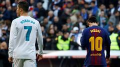 Cirstiano Ronaldo y Leo Messi, durante un Cl&aacute;sico entre Real Madrid y Barcelona.