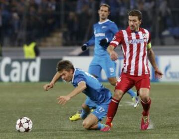 Gabi del Atlético de Madrid y Oleg Shatov del Zenit St Petersburg durante el partido de Champions League en el estadio Petrovsky de San Petersburgo