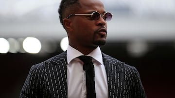 (FILES) This file photo taken on May 21, 2022 shows Manchester United's Patrice Evra at Old Trafford in Manchester, north-west England on May 21, 2022. - A Paris court will rule on February 9, 2023 on a case over charges of "homophobic insults" against Evra. (Photo by Lindsey Parnaby / AFP)