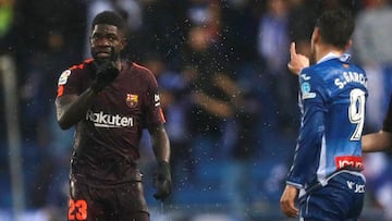 Umtiti discute con Sergio Garc&iacute;a.