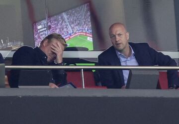 Barcelona head coach Ronald Koeman (left) reacts during his side's defeat to Atlético Madrid.