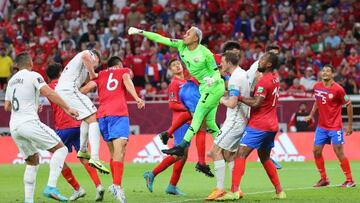 Costa Rica's goalkeeper Keylor Navas (C) punches the ball clear during the FIFA World Cup 2022 inter-confederation play-offs match between Costa Rica and New Zealand on June 14, 2022, at the Ahmed bin Ali Stadium in the Qatari city of Ar-Rayyan. (Photo by KARIM JAAFAR / AFP) (Photo by KARIM JAAFAR/AFP via Getty Images)