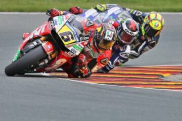 Stefan Bradl, Jorge Lorenzo y Valentino Rossi.