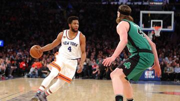 Apr 2, 2017; New York, NY, USA; New York Knicks point guard Chasson Randle (4) dribbles the ball as Boston Celtics center Kelly Olynyk (41) defends during the first quarter at Madison Square Garden. Mandatory Credit: Brad Penner-USA TODAY Sports