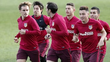 Los jugadores del Atlético durante el entrenamiento.