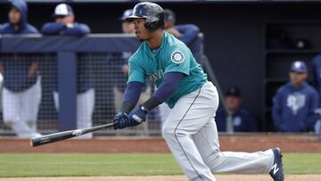 Seattle Mariners shortstop Jean Segura watches a single during the first inning of a spring training baseball game against the San Diego Padres, Friday, Feb. 23, 2018, in Peoria, Ariz. (AP Photo/Charlie Neibergall)