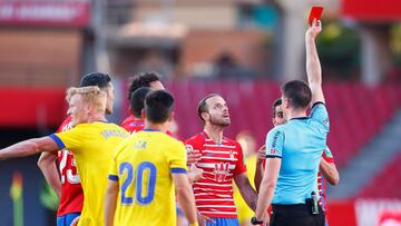 GRANADA, SPAIN - MAY 02: Roberto Soldado of Granada CF receives a red card during the La Liga Santander match between Granada CF and Cadiz CF at Estadio Nuevo Los Carmenes on May 02, 2021 in Granada, Spain. Sporting stadiums around Spain remain under stri