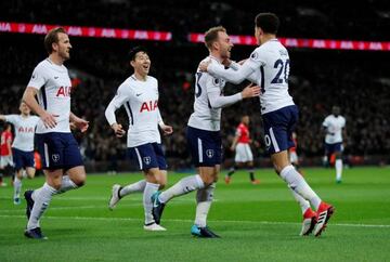 Tottenham's Christian Eriksen celebrates with Dele Alli, Harry Kane and Son Heung-min after scoring their first goal against Man Utd.