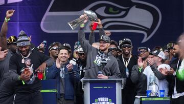 Feb 11, 2026; Seattle, WA, USA; Seattle Seahawks quarterback Sam Darnold holds the Vince Lombardi trophy during the Super Bowl LX trophy celebration at Lumen Field. Mandatory Credit: Kirby Lee-Imagn Images
