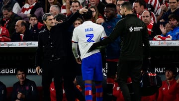 Barcelona's Spanish defender #03 Alejandro Balde leaves after resulting injured during the Spanish Copa del Rey (King's Cup) quarter final first leg football match between  Athletic Club Bilbao and FC Barcelona at the San Mames stadium in Bilbao on January 24, 2024. (Photo by ANDER GILLENEA / AFP)