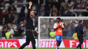 Real Madrid's Spanish coach Xabi Alonso waves from the pitch at the end of the Spanish League football match between Real Madrid CF and Valencia CF at Santiago Bernabeu Stadium in Madrid on November 1, 2025. (Photo by Oscar DEL POZO / AFP)