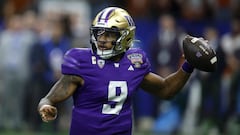 Michael Penix Jr. #9 of the Washington Huskies throws a pass