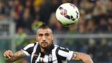 GEN01. G&Eacute;NOVA (ITALIA), 29/10/2014.- Arturo Vidal de la Juventus en acci&oacute;n ante el G&eacute;nova. Mi&eacute;rcoles 29 de octubre de 2014, durante un partido de la Serie A italiana en el estadio Luigi Ferraris de G&eacute;nova (Italia). EFE/DANIEL DAL ZENNARO