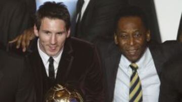 Pelé, con Messi en una entrega del Balón de Oro.