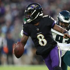 Who has the NFL record for most rushing yards in a single season by a quarterback?