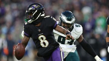 BALTIMORE, MARYLAND - DECEMBER 01: Lamar Jackson #8 of the Baltimore Ravens scrambles with the ball during the first quarter against the Philadelphia Eagles at M&T Bank Stadium on December 01, 2024 in Baltimore, Maryland. Patrick Smith/Getty Images/AFP (Photo by Patrick Smith / GETTY IMAGES NORTH AMERICA / Getty Images via AFP)