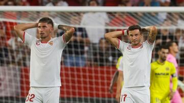 Carmona y Saúl, tras recibir un gol del Villarreal.
