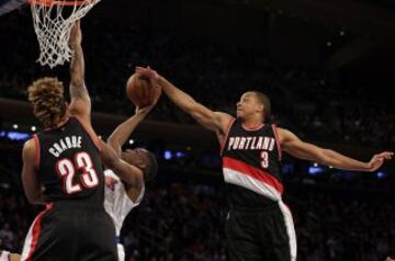 Langston Galloway y C.J. McCollum.