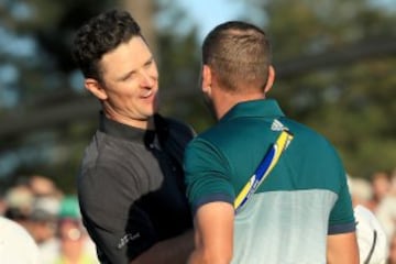 Justin Rose congratulates Sergio Garcia.