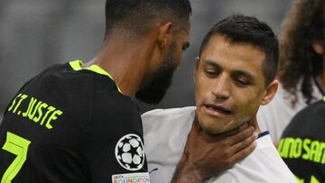 Sporting Lisbon's Dutch defender Jerry St. Juste reacts against Marseille's Chilean forward Alexis Sanchez (R) during the UEFA Champions League group D, football match between Olympique Marseille (OM) and Sporting Lisbon at the Stade Velodrome on October 4, 2022. (Photo by NICOLAS TUCAT / AFP) (Photo by NICOLAS TUCAT/AFP via Getty Images)