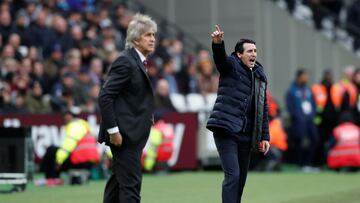 Soccer Football - Premier League - West Ham United v Arsenal - London Stadium, London, Britain - January 12, 2019 West Ham manager Manuel Pellegrini and Arsenal manager Unai Emery look on during the match REUTERS/David Klein EDITORIAL U