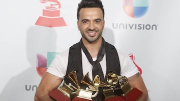 18th&nbsp;Latin Grammy Awards &ndash; Photo Room &ndash; Las Vegas, Nevada, U.S.,&nbsp;16/11/2017&nbsp;&ndash; Luis Fonsi holds his awards for Song of the Year, Record of the Year and Best Long Form Music Video for &quot;Despacito&quot; and Best Urban Fusion/Performance for  &quot;Despacito (Remix)&quot;. REUTERS/Steve Marcus