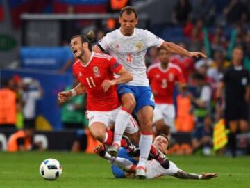 Gareth Bale con Pavel Mamaev.