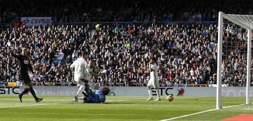 Benzema (third left) scores past Ochoa.