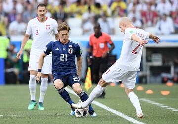 Rafal Kurzawa y Gotoku Sakai.