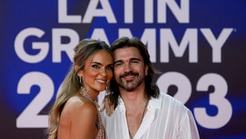 Juanes and Karen Martinez pose on the red carpet during the 24th Annual Latin Grammy Awards show in Seville, Spain, November 16, 2023. REUTERS/Marcelo del Pozo