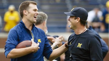 Sep 17, 2016; Ann Arbor, MI, USA; New England Patriots quarterback Tom Brady and Michigan Wolverines head coach Jim Harbaugh laugh during warm ups prior to the game against the Colorado Buffaloes at Michigan Stadium. Mandatory Credit: Rick Osentoski-USA TODAY Sports ORG XMIT: USATSI-269964 ORIG FILE ID:  20160917_mje_aa1_005.jpg