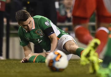 Republic of Ireland's Seamus Coleman lies injured