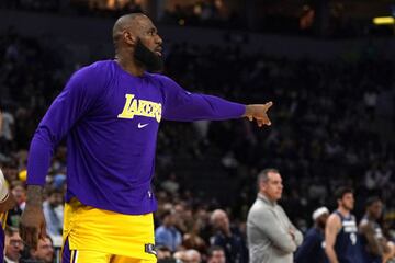 Mar 16, 2022; Minneapolis, Minnesota, USA; Los Angeles Lakers forward LeBron James (6) has words with Minnesota Timberwolves center Karl-Anthony Towns (32) during the fourth quarter at Target Center. Mandatory Credit: Nick Wosika-USA TODAY Sports