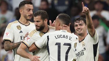 Real Madrid's Spanish forward #21 Brahim Diaz (R) celebrates after scoring his team's first goal during the Spanish league football match between Real Madrid CF and UD Las Palmas at the Santiago Bernabeu stadium in Madrid on September 27, 2023. (Photo by Thomas COEX / AFP)