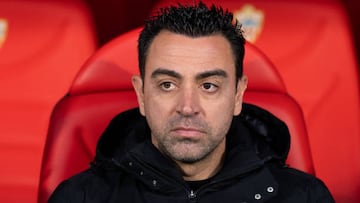 ALMERIA, SPAIN - FEBRUARY 26: Xavi Hernandez, head coach of FC Barcelona looks on prior to  the LaLiga Santander match between UD Almeria and FC Barcelona at Juegos Mediterraneos on February 26, 2023 in Almeria, Spain. (Photo by Aitor Alcalde Colomer/Getty Images)