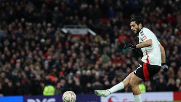 Fulham's Mexican striker #07 Raul Jimenez scores his penalty in the shoot-out in the English FA Cup fifth round football match between Manchester United and Fulham at Old Trafford in Manchester, north west England, on March 2, 2025. (Photo by Darren Staples / AFP) / RESTRICTED TO EDITORIAL USE. No use with unauthorized audio, video, data, fixture lists, club/league logos or 'live' services. Online in-match use limited to 120 images. An additional 40 images may be used in extra time. No video emulation. Social media in-match use limited to 120 images. An additional 40 images may be used in extra time. No use in betting publications, games or single club/league/player publications. /