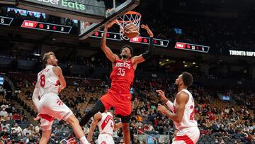 Oct 11, 2021; Toronto, Ontario, CAN; Houston Rockets center Christian Wood (35) dunks against Toronto Raptors forward Sam Dekker (8) during the first half at Scotiabank Arena. Mandatory Credit: Kevin Sousa-USA TODAY Sports