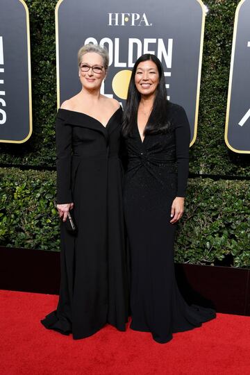 Meryl Streep acompañada de la activista Ai-jen Poo.