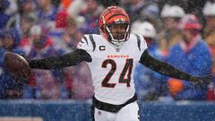 Jan 22, 2023; Orchard Park, New York, USA; Cincinnati Bengals safety Vonn Bell (24) recovers a fumble in the first quarter during an NFL divisional playoff football game between the Cincinnati Bengals and the Buffalo Bills during an AFC divisional round game at Highmark Stadium. Mandatory Credit: Kareem Elgazzar-USA TODAY Sports