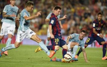 Lionel Messi entre Raúl Albentosa y Jaime Jiménez.