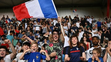 France�s supporters wave a French flag during the UEFA Women's Nations League group A2 football match between France and Switzerland at the Marcel Picot stadium in Nancy, eastern France, on May 30, 2025. (Photo by S�bastien BOZON / AFP)
