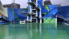 A picture taken on August 10, 2016 at the Maria Lenk Aquatics Stadium in Rio de Janeiro shows the diving pool of the Rio 2016 Olympic Games.  
 Red-faced Rio Olympics organisers anxiously waited for the diving water to turn back from a nervy green to classic blue as a lack of chemicals was revealed as the cause of the colour changes. Heavy rain slowed the flow of new chemicals added to the water which was also green in the pool used for the synchronised swimming and water-polo.
  / AFP PHOTO / CHRISTOPHE SIMON