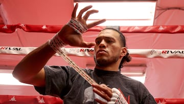 BURIEN, WASHINGTON - NOVEMBER 09: David �El Monstruo� Benavidez tapes his hands before working out with his brother Jose Benavidez Jr. (not pictured) during a media training session on November 09, 2023 in Burien, Washington. The Benavidez brothers will enter the ring on Saturday, November 25 in a Premier Boxing Champions event from Michelob ULTRA Arena at Mandalay Bay Resort and Casino in Las Vegas.   Steph Chambers/Getty Images/AFP (Photo by Steph Chambers / GETTY IMAGES NORTH AMERICA / Getty Images via AFP)