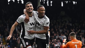 Soccer Football - Premier League - Fulham v Leeds United - Craven Cottage, London, Britain - April 22, 2023 Fulham's Andreas Pereira celebrates scoring their second goal with teammate Bobby Decordova-Reid REUTERS/Dylan Martinez EDITORIAL USE ONLY. No use with unauthorized audio, video, data, fixture lists, club/league logos or 'live' services. Online in-match use limited to 75 images, no video emulation. No use in betting, games or single club /league/player publications.  Please contact your account representative for further details.