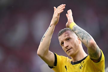 Dortmund's German forward #11 Marco Reus reacts after the German first division Bundesliga football match between Mainz 05 and BVB Borussia Dortmund in Mainz, western Germany on May 11, 2024. Mainz won the match 3-0. (Photo by Kirill KUDRYAVTSEV / AFP) / DFL REGULATIONS PROHIBIT ANY USE OF PHOTOGRAPHS AS IMAGE SEQUENCES AND/OR QUASI-VIDEO