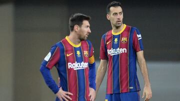 Messi y Busquets.