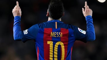 Lionel Messi of FC Barcelona celebrates after scoring his team's fourth goal during the La Liga match between FC Barcelona and RCD Espanyol at the Camp Nou stadium