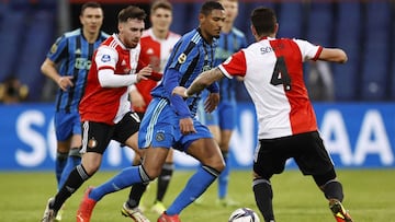 Ajax&#039;s Sebastien Haller (C) fights for the ball with  Feyenoord&#039;s Argentinian defender Marcos Senesi (R) and Feyenoord&#039;s Turkish midfielder Orkun Kokcu (L) during the Dutch Eredivisie match between Feyenoord and Ajax at de Kuip Stadium in R