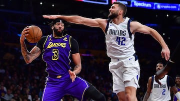 Mar 17, 2023; Los Angeles, California, USA; Los Angeles Lakers forward Anthony Davis (3) moves the ball against Dallas Mavericks forward Maxi Kleber (42) during the second half at Crypto.com Arena. Mandatory Credit: Gary A. Vasquez-USA TODAY Sports